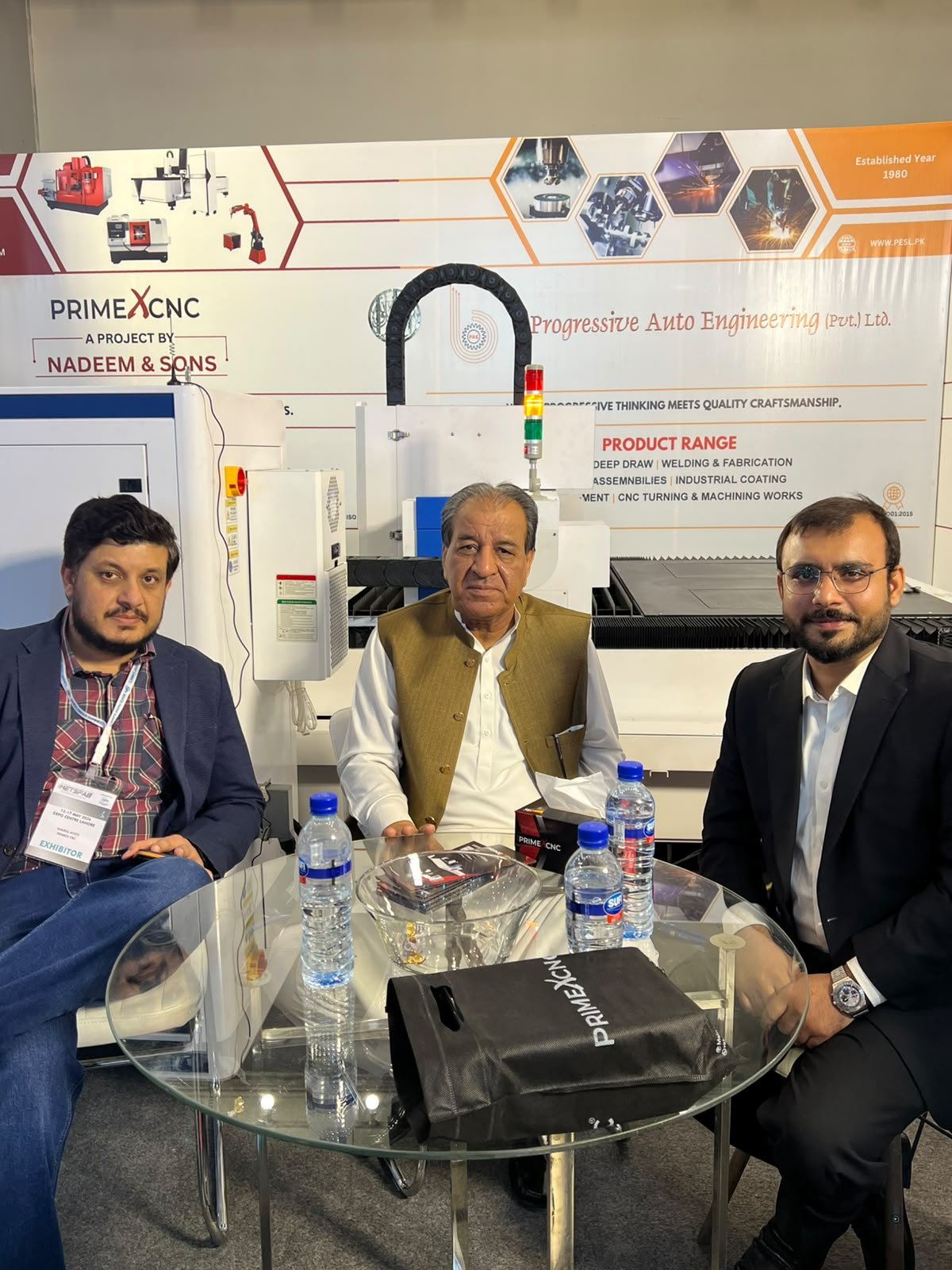 Business meeting with visitors at an exhibition booth