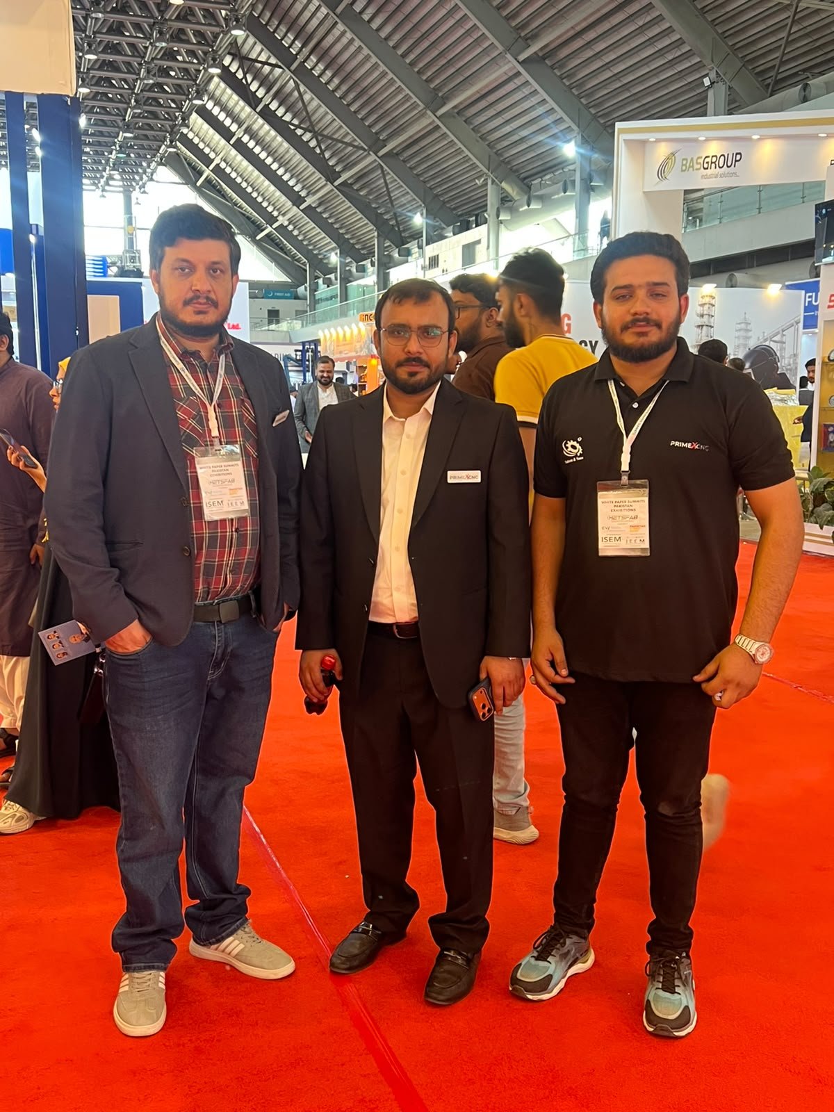 PrimeX CNC team members at an industry exhibition
