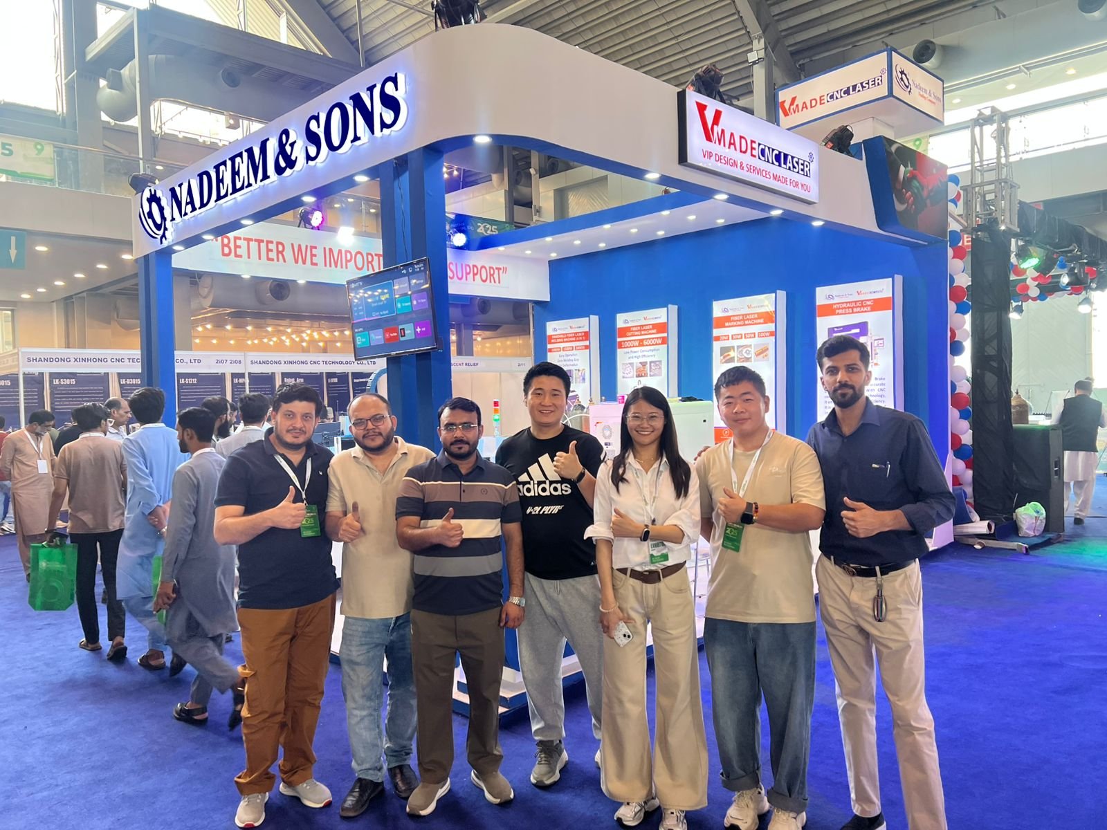 Industry team gathering at an exhibition booth